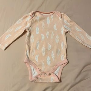 Pink - Salmon like color, feathered one piece body suit for newborn.